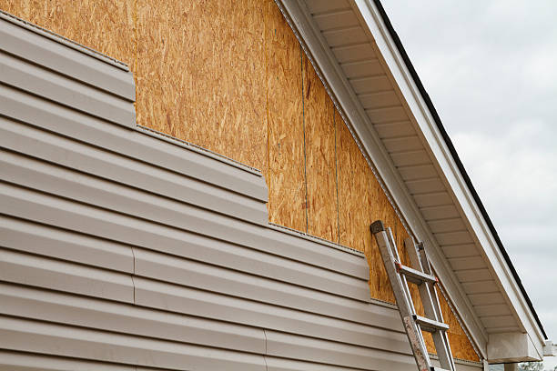 Professional Siding Installation technician working in Sudbury, MA